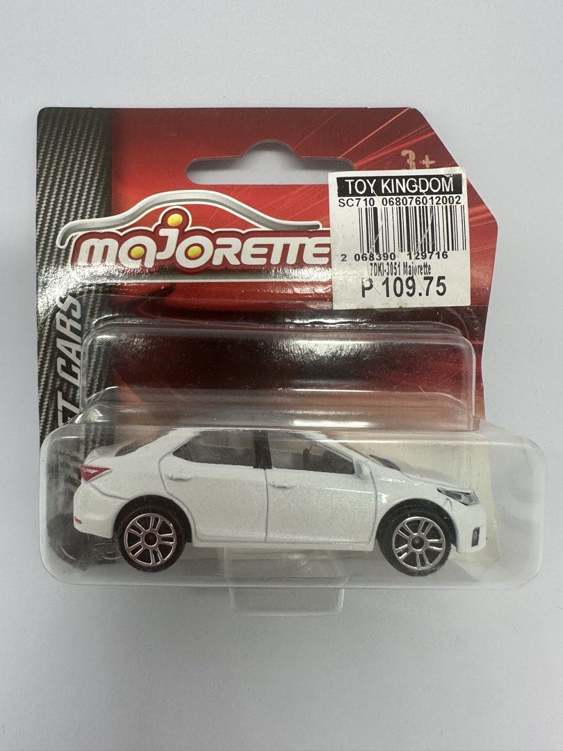 Majorette White Sedan Toy Car (Category: Vehicle & Diecast Models) located in Caloocan City. Submitted by xenasales (Listing ID 1442798260, Image 1). Description: Majorette - Toyota Corolla Altis Sealed 160 Pesos.