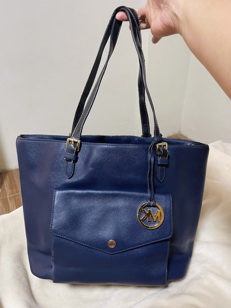 Michael Kors Navy Blue Leather Front Pocket Tote (Category: Shoulder Bags) located in Macabebe. Submitted by yourdita (Listing ID 1442904438, Image 1). Description: Michael Kors Navy Blue Leather Front Pocket Tote Barely using it po Spacious good for school or office .