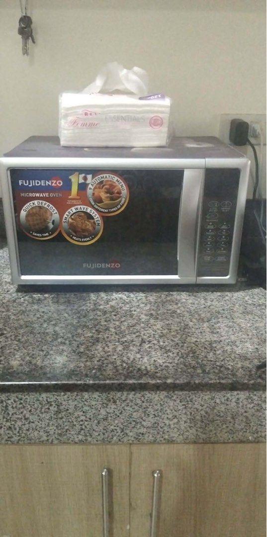 Microwave oven (Category: Other Home Appliances) located in Pasay City. Submitted by jenque (Listing ID 1442738401, Image 1). Description: Almost new pristine condition…1 mo. used…..