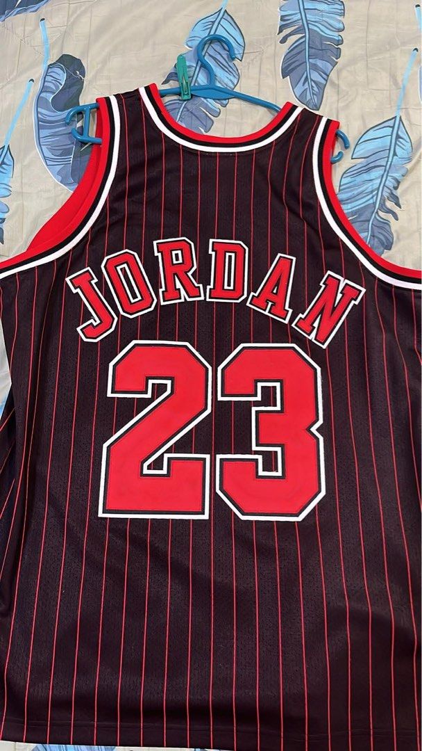 Mitchell & Ness Michael Jordan 1995-96 Bulls Jersey (Category: Activewear) located in San Pedro. Submitted by ajcee (Listing ID 1442744746, Image 2). Description: - Authentic Mitchell & Ness Hardwood Classics Jersey - Features Michael Jordan's 1995-96 Chicago Bulls #23 - Classic black with red pinstripe design - Perfect collectible for any Michael Jordan enthusiast Original Price when bought: ₱19,999.00 From: NBA Store Philippines Rfs: Wedding Fu