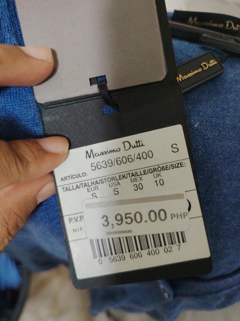 Mossimo Dutti Blue V-Neck Twist Front Cardigan (Category: Coats, Jackets and Outerwear) located in Cainta. Submitted by badet0521 (Listing ID 1442806446, Image 3). Description: - Brand: Massimo Dutti - Color: Blue - Style: V-neck Cardigan - Detail: Twist front - Sleeves: Long - Closure: Button-up front - Size: S - Condition: Brand new with original tags attached.
