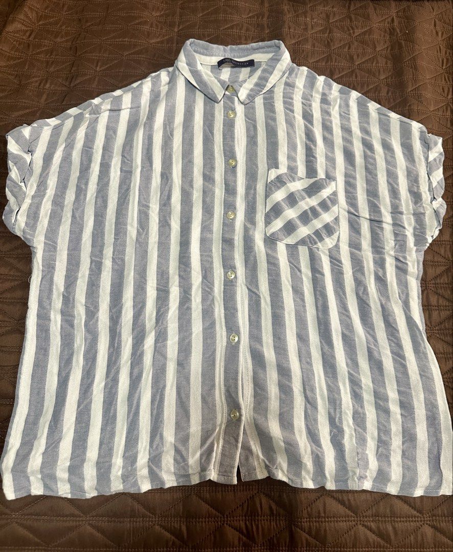 M&S Collection Blue & White Striped Button-Up Shirt (Category: Shirts) located in Quezon City. Submitted by declutter_incorporated (Listing ID 1442785573, Image 1). Description: - M&S Collection shirt - Blue and white vertical stripes - Chest pocket - Button-up front - Short sleeves with rolled cuffs - Comfortable and casual - Great for everyday wear.