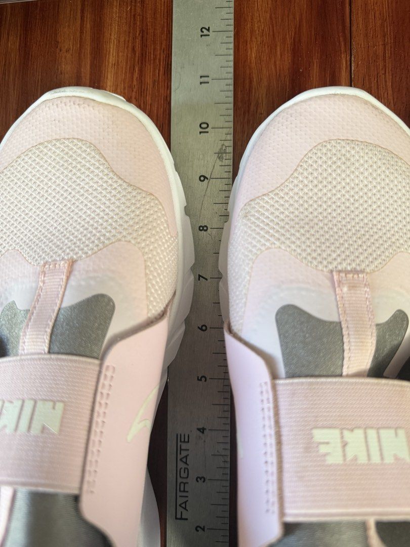 Nike Pink Slip-On Shoes (Category: Sneakers) located in Paranaque City. Submitted by shop333 (Listing ID 1442923615, Image 2). Description: - 💯 original LISTED PRICE IS THE LAST PRICE - please scroll photos to check the size Video will be sent before purchase I do not accept returns so pls check carefully before buying Pink Nike slip-on shoes - Kids' size - Easy to put on and take off - Elastic strap across the top with Nike logo - Great for eve