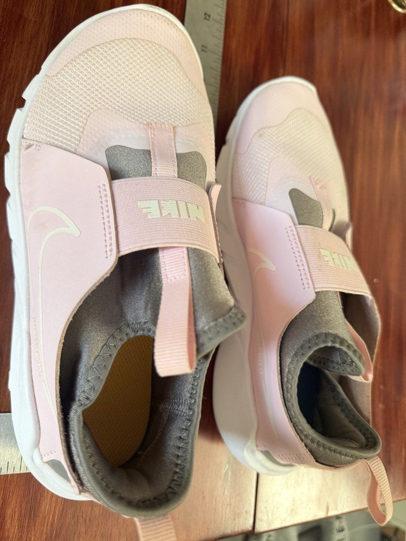 Nike Pink Slip-On Shoes (Category: Sneakers) located in Paranaque City. Submitted by shop333 (Listing ID 1442923615, Image 3). Description: - 💯 original LISTED PRICE IS THE LAST PRICE - please scroll photos to check the size Video will be sent before purchase I do not accept returns so pls check carefully before buying Pink Nike slip-on shoes - Kids' size - Easy to put on and take off - Elastic strap across the top with Nike logo - Great for eve