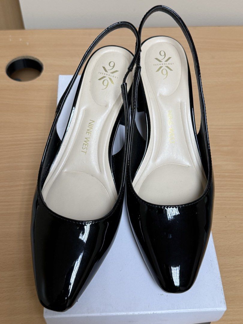 Nine West Black Patent Slingback Heels (Category: Heels) located in Manila. Submitted by iloveyouna_ (Listing ID 1442823057, Image 2). Description: - Brand: Nine West - Style: Black patent slingback heels - Heel Type: Low block heel - Features: Comfortable slingback strap, '9 Technology' insole for extra cushioning - Occasion: Perfect for work or a night out - Condition: Comes with original box.