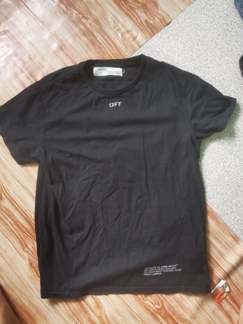 OFF-WHITE Black Graphic T-Shirt Size M (Category: Tshirts & Polo Shirts ) located in Cabanatuan. Submitted by chinithou (Listing ID 1442813155, Image 1). Description: - Authentic Black OFF-WHITE T-Shirt - Size: Medium (M) - Iconic OFF logo on the front - Large graphic arrows on the back - Material: 100% Cotton - Ideal for everyday casual wear.