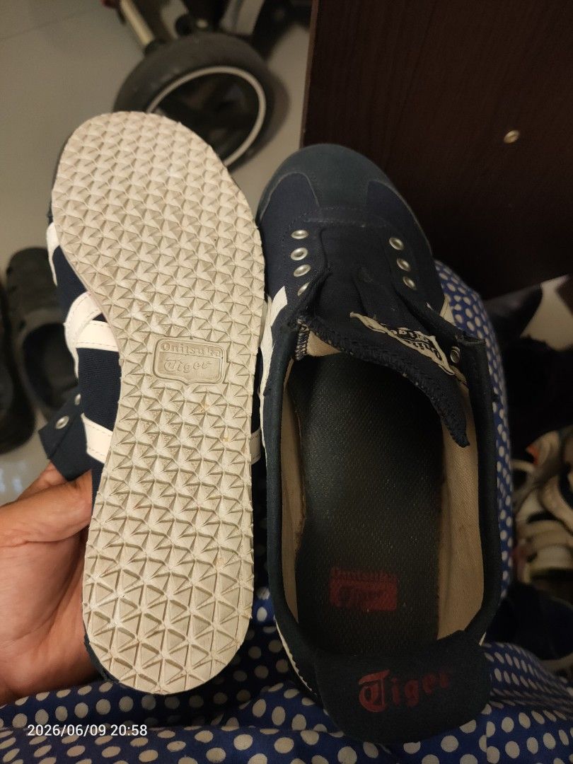 Onitsuka Tiger Mexico 66 Navy White Sneakers (Category: Sneakers) located in Singapore. Submitted by deepika.garg (Listing ID 1442887031, Image 3). Description: - Classic Onitsuka Tiger sneakers - Color: Navy blue with white stripes - Size: 42 EU / 8.5 US - Made in Indonesia - Ideal for casual wear - Shows some signs of wear, but still in good usable condition.