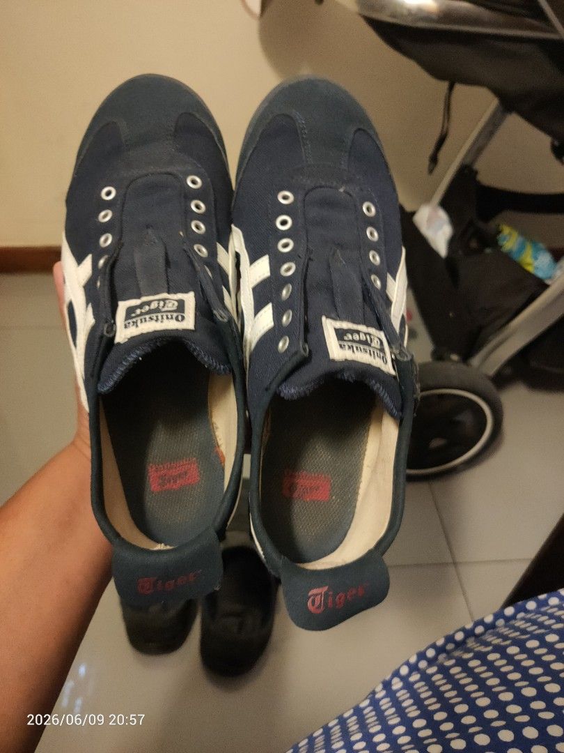 Onitsuka Tiger Mexico 66 Navy White Sneakers (Category: Sneakers) located in Singapore. Submitted by deepika.garg (Listing ID 1442887031, Image 1). Description: - Classic Onitsuka Tiger sneakers - Color: Navy blue with white stripes - Size: 42 EU / 8.5 US - Made in Indonesia - Ideal for casual wear - Shows some signs of wear, but still in good usable condition.