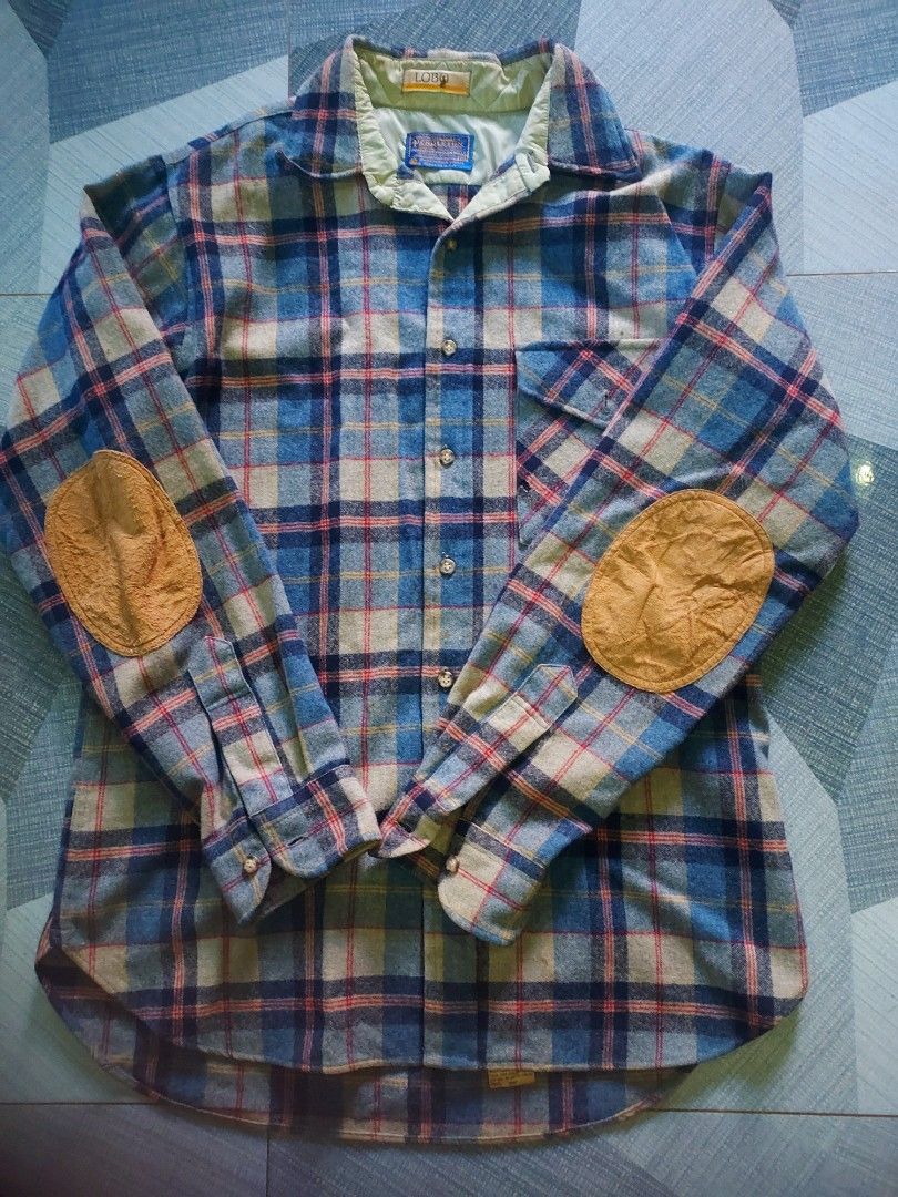 Pendleton Lobo Wool Flannel Shirt with Elbow Patches vintage (Category: Tshirts & Polo Shirts ) located in Tagbilaran City. Submitted by topernzvault (Listing ID 1442731540, Image 1). Description: - Classic Pendleton plaid flannel shirt - Features durable suede elbow patches - Made from 100% virgin wool - Tagged size L (please check measurements for best fit) - Easy care: Machine washable - Ideal for layering with other clothing.1960's.