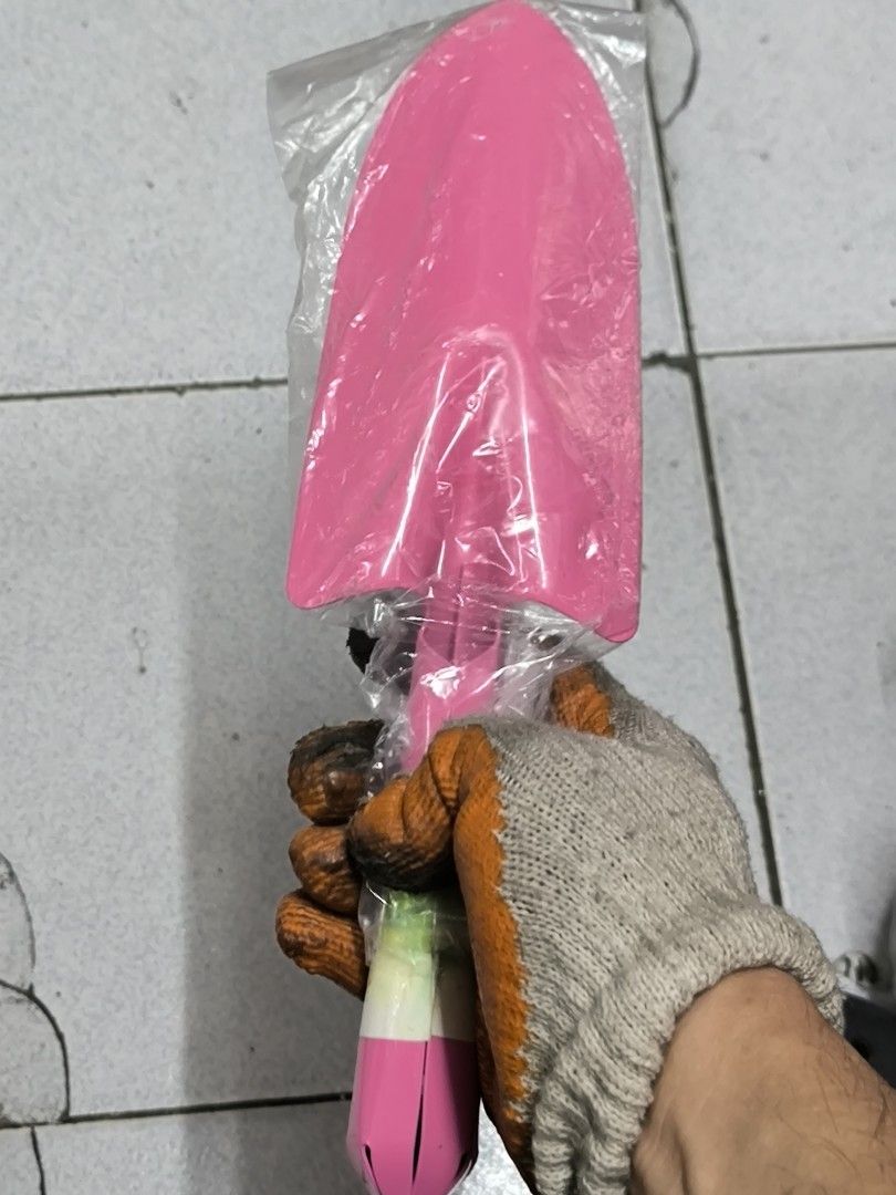 Pink Gardening Trowel with Ergonomic Handle (Category: Gardening Tools & Ornaments) located in Angeles City. Submitted by yellowbrickstore (Listing ID 1442767305, Image 2). Description: - Pink gardening trowel - Great for planting and digging - Comfortable grip handle - Comes in original plastic packaging - Useful for your gardening needs - Easy to use for small gardening tasks shipping via jnt express Saturday sked only Friday cut off pick up AC