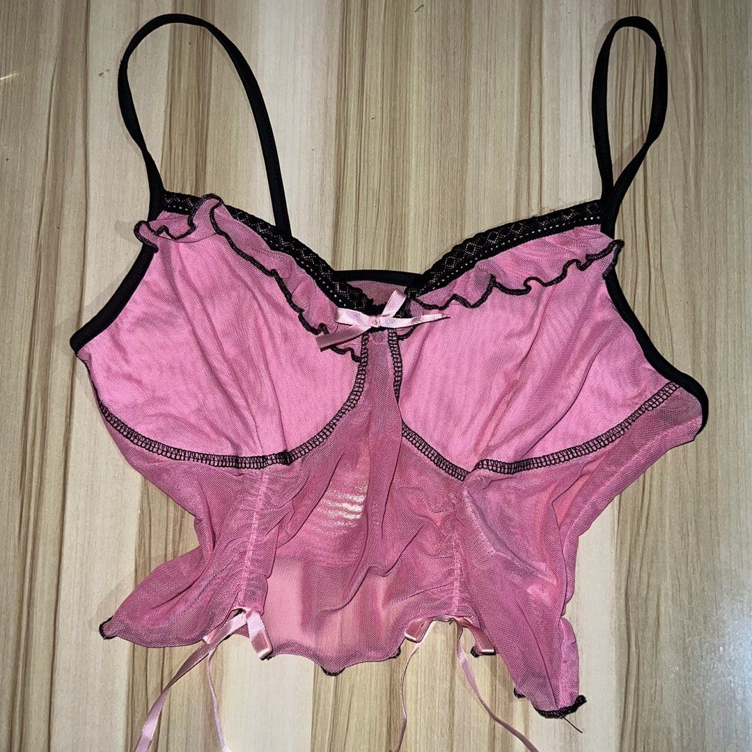 Pink Mesh Corset Top with Black Trim (Category: Others Tops) located in Manila. Submitted by deixawei (Listing ID 1442743028, Image 2). Description: NEGOTIABLE! - Adorable pink mesh corset top - Features stylish black trim - Adjustable straps for a perfect fit - Cute little bow detail in the front - Back has adjustable ties for custom sizing - Versatile: great for layering or wearing on its own - Size: Medium (M).