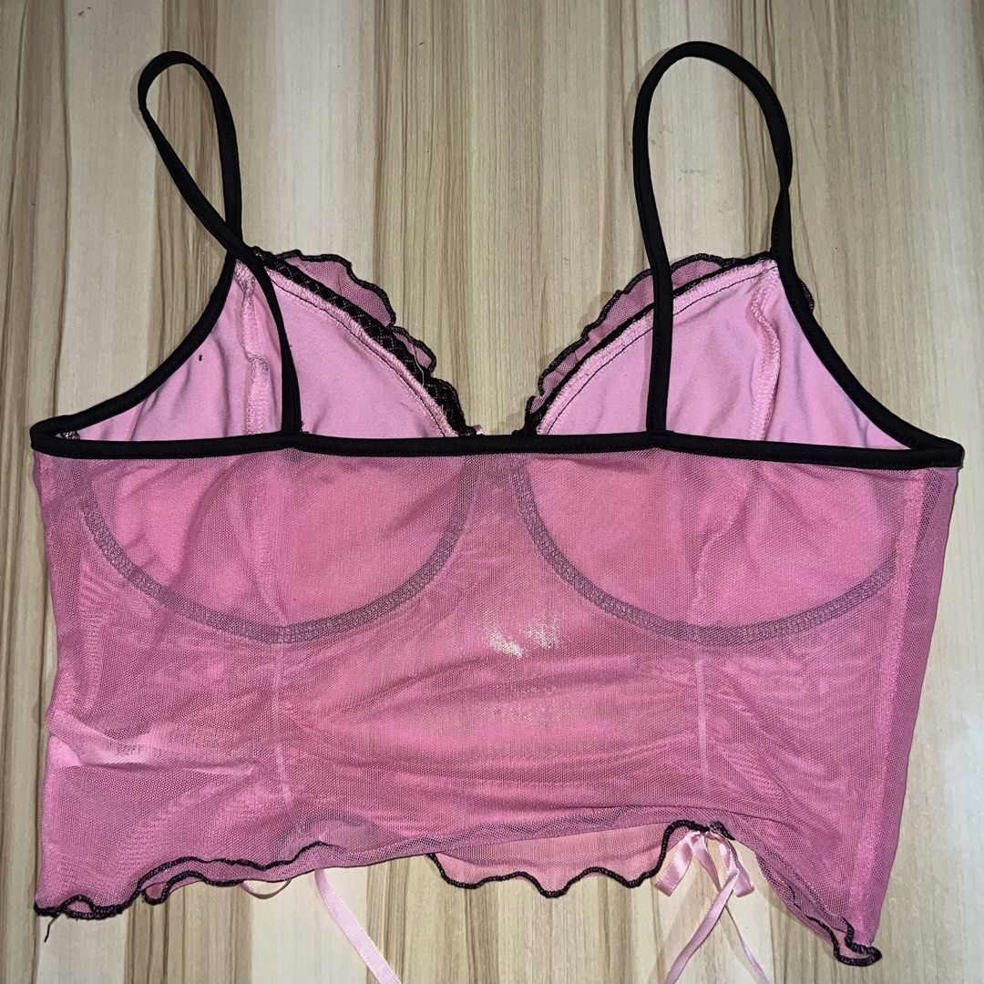 Pink Mesh Corset Top with Black Trim (Category: Others Tops) located in Manila. Submitted by deixawei (Listing ID 1442743028, Image 3). Description: NEGOTIABLE! - Adorable pink mesh corset top - Features stylish black trim - Adjustable straps for a perfect fit - Cute little bow detail in the front - Back has adjustable ties for custom sizing - Versatile: great for layering or wearing on its own - Size: Medium (M).