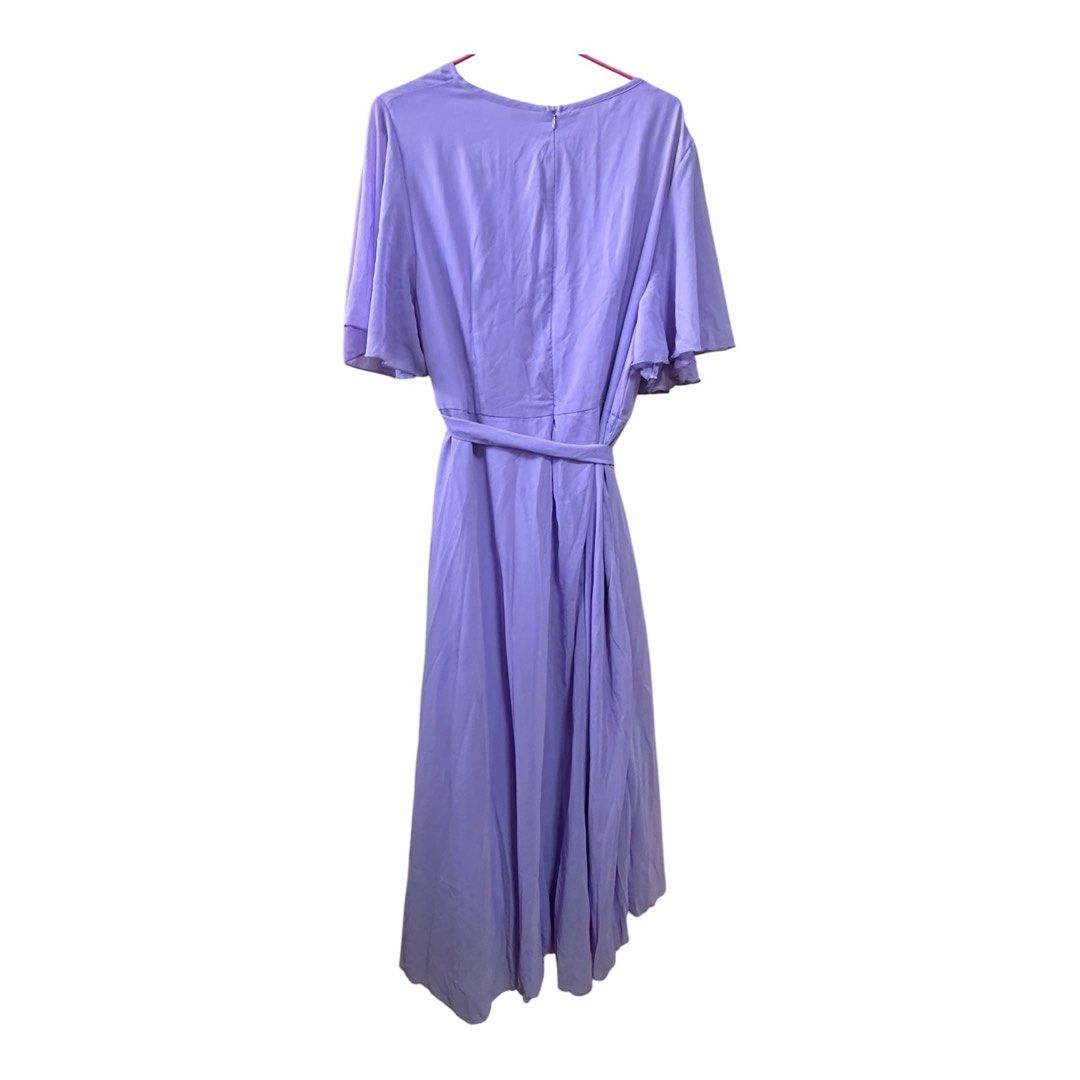 Plus Size Lavender Flutter Sleeve Belted Maxi Dress (Category: Dresses) located in Quezon City. Submitted by nixieeee (Listing ID 1442831223, Image 2). Description: - Flowy lavender maxi dress - Flutter sleeves - Tie belt at the waist - High-low hemline - Versatile: Great for events or casual outings - Comfortable and chic design 2xl. Very nice in actual.