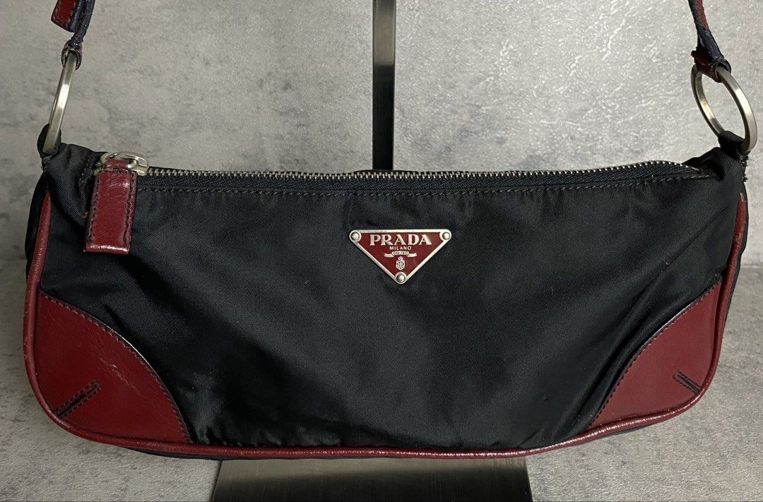 PRADA - 2000s TESSUTO NYLON BAGUETTE (Category: Luxury Bags & Wallets) located in Quezon City. Submitted by daboy_ (Listing ID 1442780993, Image 2). Description: PRADA - 2000s TESSUTO NYLON BAGUETTE Condition: 8/10 Made in: Italy Zipper: IPI No inclusions.
