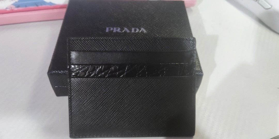 Prada Saffiano Leather Card Holder 2MC223 (Category: Wallets & Card Holders) located in Manila. Submitted by mitzza (Listing ID 1442763231, Image 2). Description: Feel free to ask for more pictures to verify authenticity, Tondo Manila Area, Prefer Lalamove.
