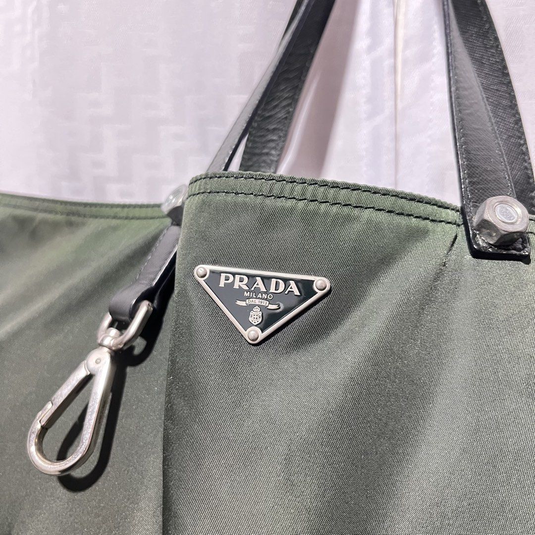 PRADA TESSUTO TRIANGLE LOGO TOTE BAG (Category: Luxury Bags & Wallets) located in Taguig. Submitted by selectthebest (Listing ID 1442766454, Image 3). Description: PRADA TESSUTO TRIANGLE LOGO TOTE BAG AUTHENTIC 9/10 CONDITION MINIMAL SIGN OF USAGE NO MAJOR FLAWS TAGUIG CITY LOCATION PM ME📩📩.