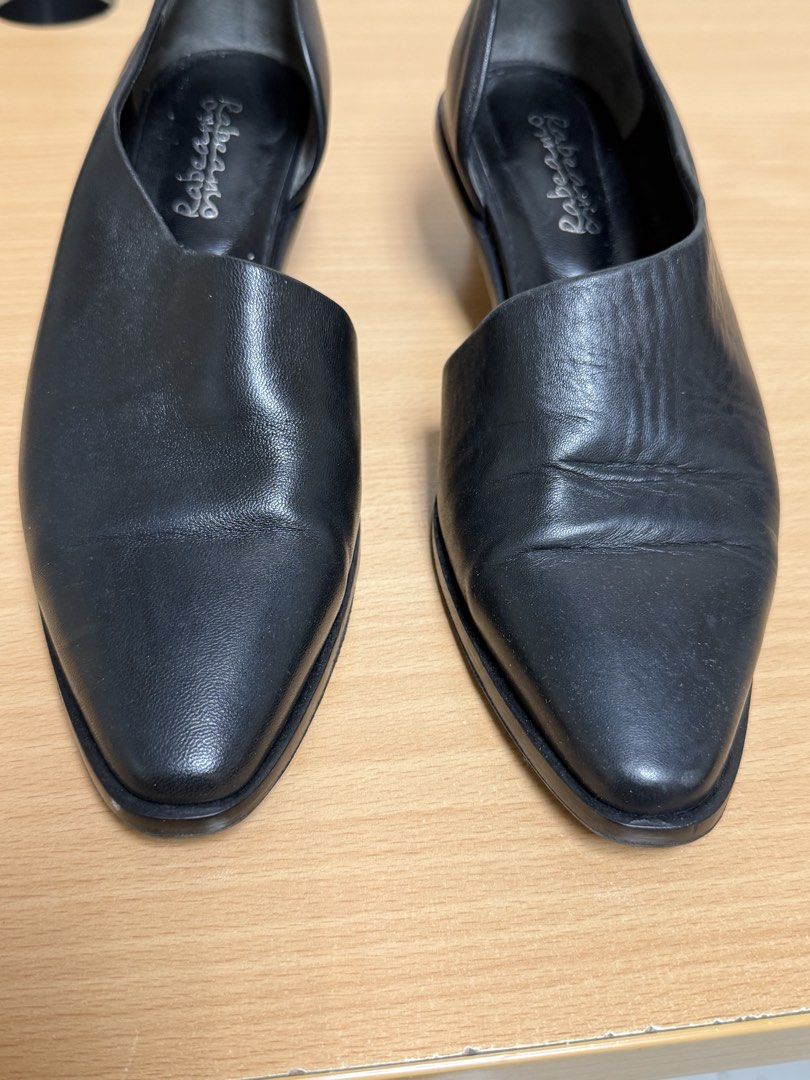 Rabeanco Black Leather D'Orsay Heels (Category: Heels) located in Manila. Submitted by iloveyouna_ (Listing ID 1442822923, Image 2). Description: - Brand: Rabeanco - Style: D'Orsay heels - Material: Black Leather - Toe: Pointed - Heel Height: Low - Size: 38 - Origin: Made in Italy - Condition: Some creasing on leather, soles show wear..