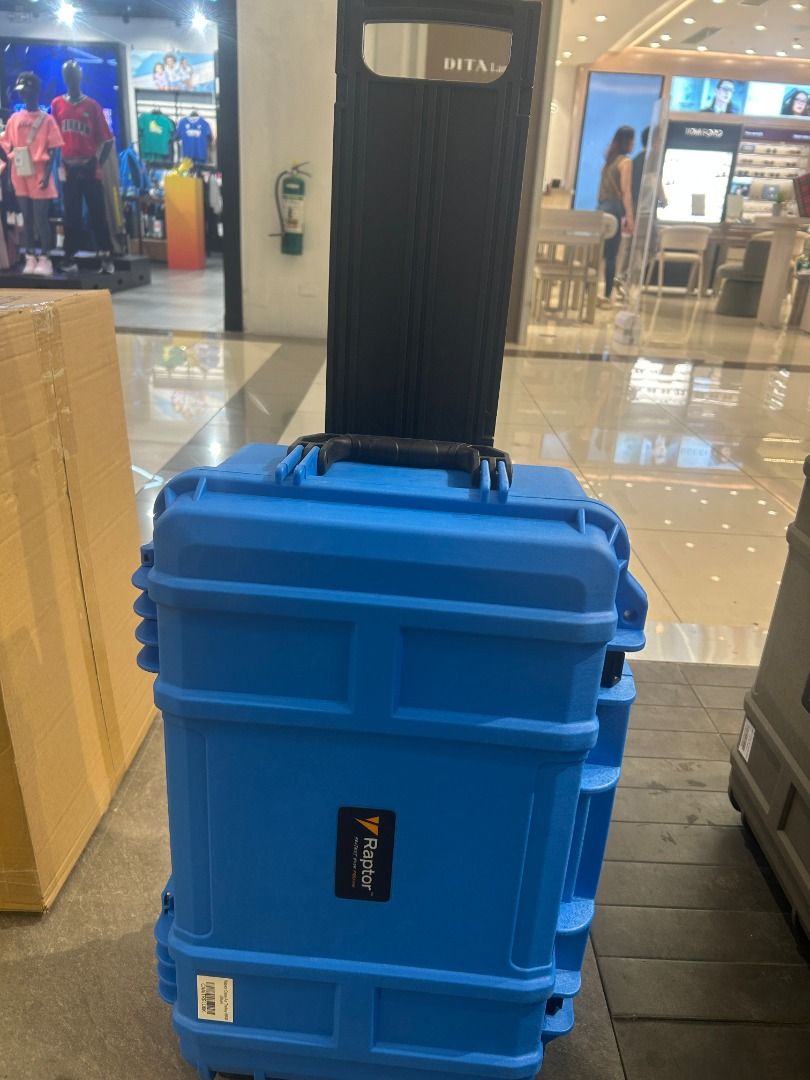 Raptor Blue Protective Hard Case with Wheels and Foam (Category: Cases & Sleeves) located in Caloocan City. Submitted by emm_enable (Listing ID 1442798212, Image 1). Description: - Blue Raptor protective case - Built-in wheels and retractable handle for easy transport - Foam-lined interior for maximum gear protection - Secure latches to keep your items safe - Ideal for cameras, equipment, or valuables needing extra security - Ready for your next 