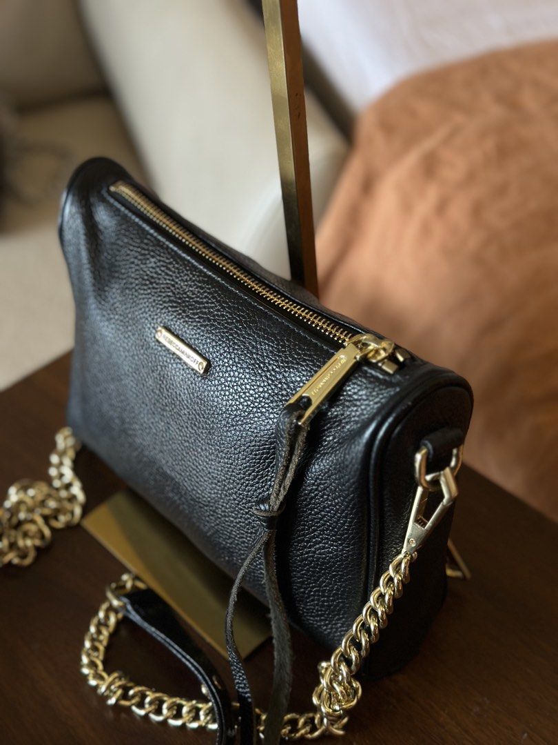 Rebecca Minkoff Black Leather Studded Chain Crossbody Bag (Category: Cross-body Bags) located in Manila. Submitted by margaux12345678 (Listing ID 1442848659, Image 3). Description: ✨🖤 Authentic Rebecca Minkoff 5 Zip Crossbody Bag 🖤✨ Crafted from 100% genuine black pebbled leather and finished with Rebecca Minkoff’s signature gold-tone hardware. ✨ One of my personal favorites! 🥺 The design is effortlessly stylish, versatile, and perfect for eve
