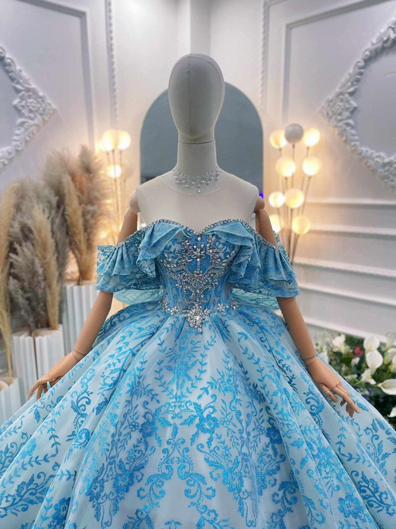 RENTING Debut Light Blue Gown (Category: Evening dresses & gowns) located in Manila. Submitted by zeallion-7882 (Listing ID 1442747684, Image 2). Description: Used only once at a Debut, good as new. Adjustable corset; fits waist 30-40 inch. 3 day window: 1st day - Delivery 2nd day - Gown Usage 3rd day - Returning.