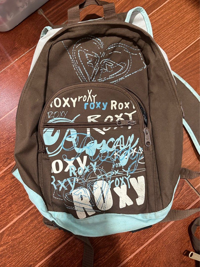 Roxy Backpack Brown Blue Graphic Print (Category: Backpacks) located in Paranaque City. Submitted by thriftclothing101 (Listing ID 1442903167, Image 1). Description: - Compartments: Main compartment, front zip pocket - Straps: Adjustable - Ideal for: School, everyday use.