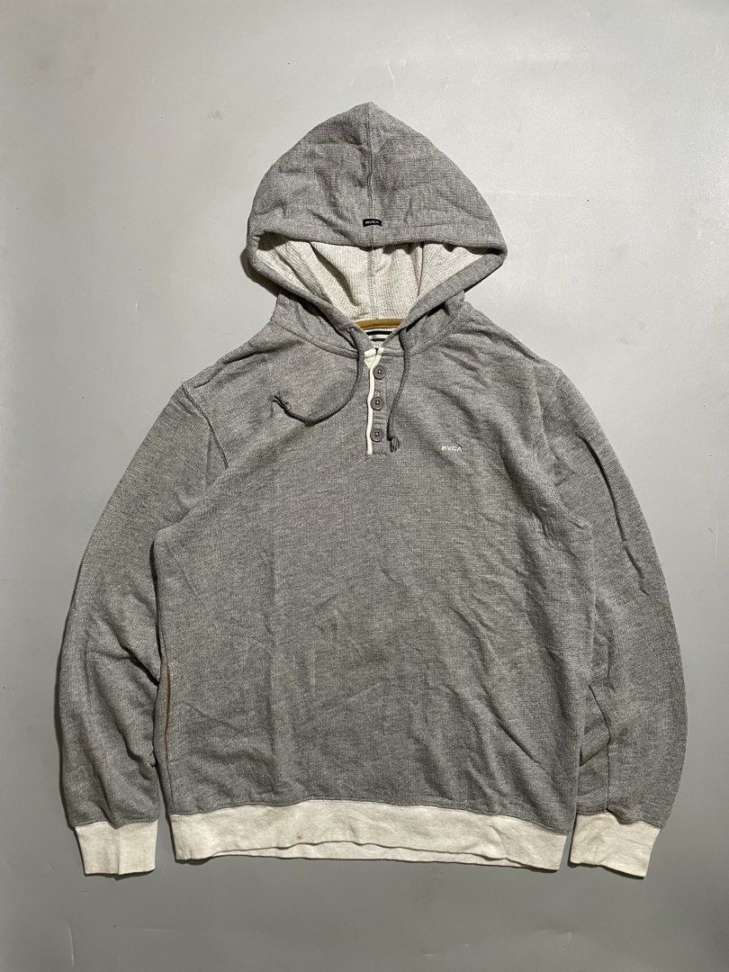 RVCA Henley Hoodie (Category: Hoodies) located in Taguig. Submitted by sellnbustle (Listing ID 1442819876, Image 1). Description: RVCA Henley Hoodie Size Large 23x28.5 Very good condition Authentic - Button-up neckline with drawstrings - Embroidered RVCA logo on chest - Ideal for casual wear.