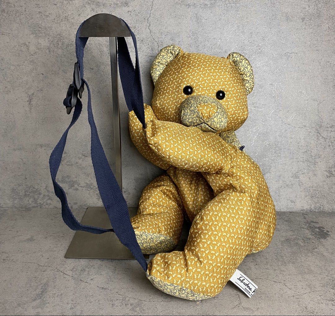 SALVATORE FERRAGAMO - 1990s RARE TEDDY BEAR BACKPACK (Category: Backpacks) located in Quezon City. Submitted by daboy_ (Listing ID 1442784307, Image 1). Description: Size: M Condition: 10/10 Made in: Italy Functionality: Features dual adjustable woven nylon shoulder straps and hidden zipper pockets integrated into the plush body, allowing it to be worn comfortably as a whimsical backpack or a statement crossbody accessory..