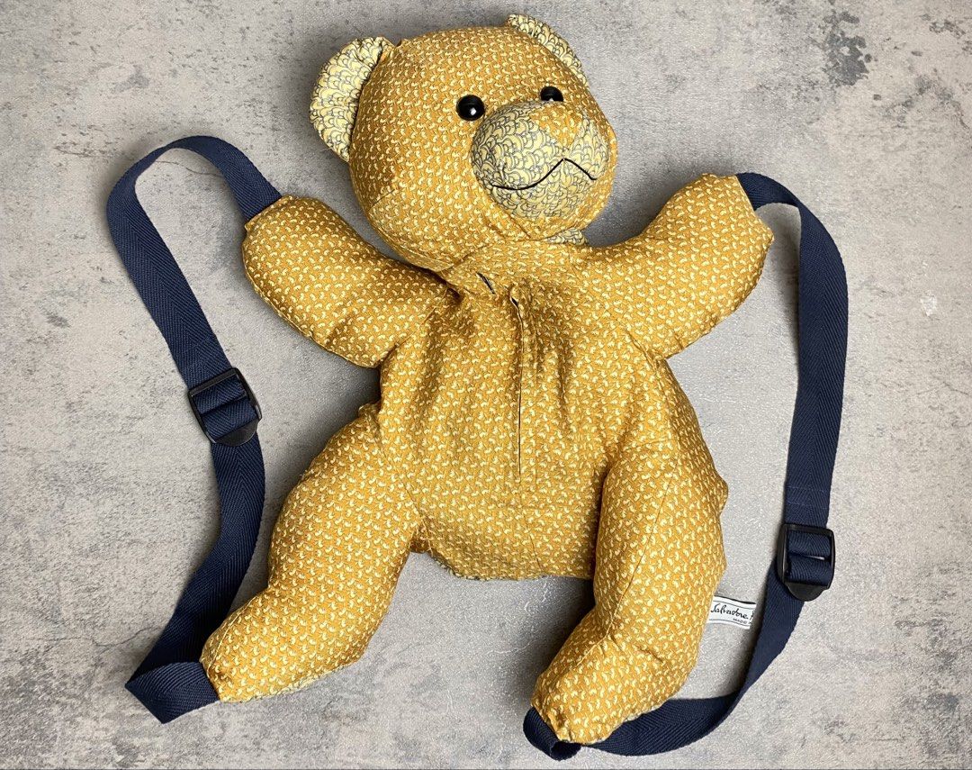 SALVATORE FERRAGAMO - 1990s RARE TEDDY BEAR BACKPACK (Category: Backpacks) located in Quezon City. Submitted by daboy_ (Listing ID 1442784307, Image 2). Description: Size: M Condition: 10/10 Made in: Italy Functionality: Features dual adjustable woven nylon shoulder straps and hidden zipper pockets integrated into the plush body, allowing it to be worn comfortably as a whimsical backpack or a statement crossbody accessory..