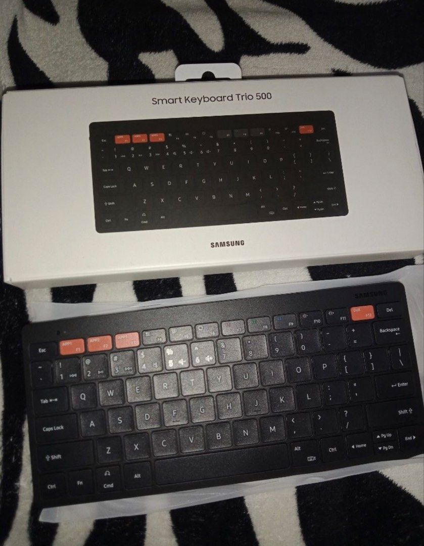 Samsung Smart Keyboard Trio 500 (Category: Computer Keyboard) located in Taguig. Submitted by _itsmargauxfinds (Listing ID 1442919783, Image 3). Description: - Samsung Smart Keyboard Trio 500 - Wireless connectivity - Dedicated keys for Samsung DeX - Compact and portable design - Ideal for multitasking on your phone or tablet - Original box included - Price is still negotiable (pm is the key).