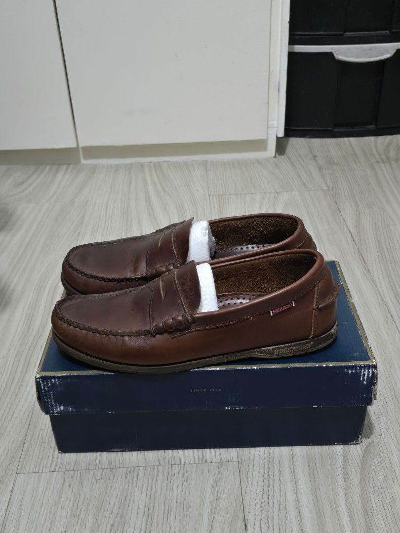 Sebago Leather Loafers Brown (Category: Dress Shoes) located in Paranaque City. Submitted by ausev (Listing ID 1442743899, Image 2). Description: Sebago Dockside Penny Loafers Leather Shoes Color: Brown Size: US 9 W (EUR 43 | UK 8.5 | 27 cm) Model: Thetford / Dockside Style Genuine full leather upper Comfortable cushioned insole Durable rubber outsole Well-used with natural leather creasing and signs of wear consistent with age, but still structu