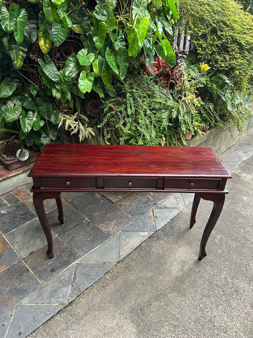 Side console table (Category: Tables & Sets) located in Singapore. Submitted by jacklee.cy (Listing ID 1442757424, Image 1). Description: Side console table length 120cm width 40cm with 3 drawers height 75cm just varnish very nice and good condition .