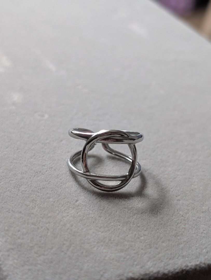 Silver Interlocking Circle Ring (Category: Rings) located in Singapore. Submitted by hana08 (Listing ID 1442756952, Image 2). Description: @$6.00 + $3.00 (postage) Stainless steel adjustable ITEM SOLD NOT EXCHANGEABLE AND NON REFUNDABLE..