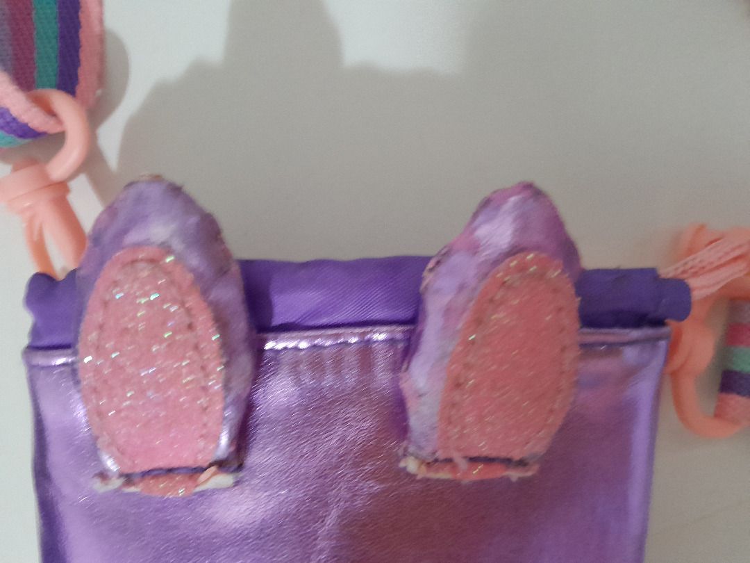 Smiggle Bottle Bag (Category: Babies & Kids Fashion) located in Singapore. Submitted by floinsg (Listing ID 1442778621, Image 3). Description: - Adorable purple Smiggle bag - Comes with a colorful striped adjustable strap - Ideal for kids to carry water bottle - Used very seldom - The colour came off in small spots (see pictures) Pick up: Holland Village Please check my other items: selling cheap toys and magazines!.