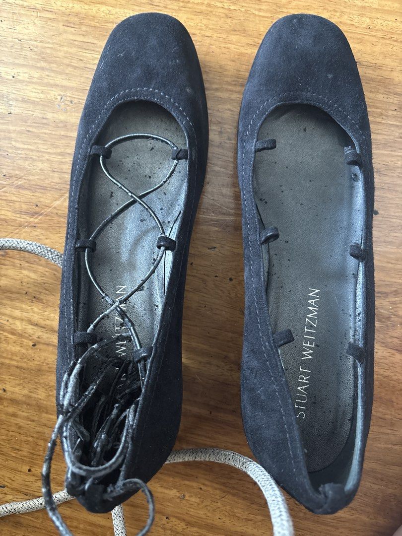 Stuart Weitzman Black Suede Lace-Up Ballet Flats (Category: Flats & Sandals) located in Manila. Submitted by changli2 (Listing ID 1442751759, Image 2). Description: - Brand: Stuart Weitzman - Style: Black Suede Ballet Flats - Feature: Lace-up detail extending up the ankle - Sole Material: Leather - Condition: Shows some wear on soles and insoles - Ideal for: Everyday wear.