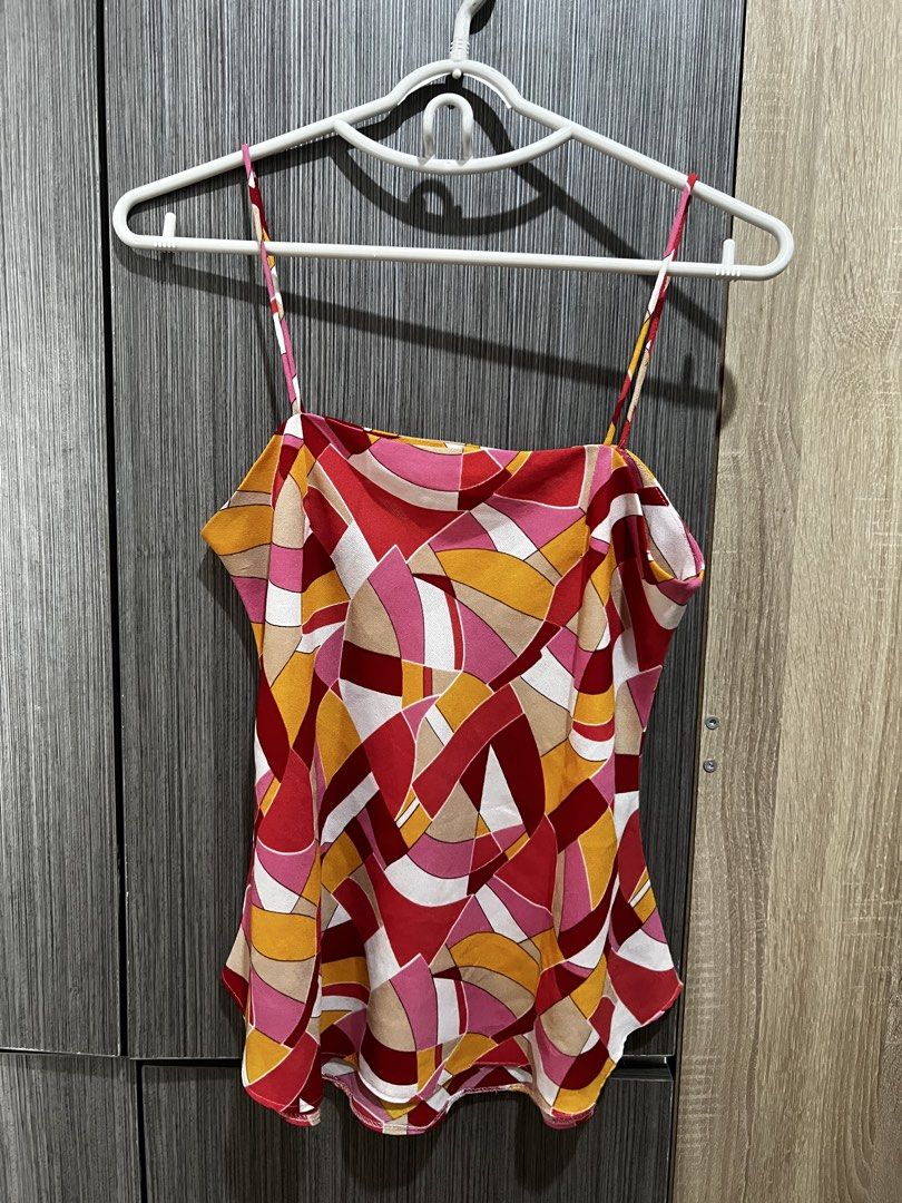 summer print sleeves neck top (Category: Sleeveless) located in Quezon City. Submitted by cheeksieee (Listing ID 1442923131, Image 2). Description: summer top! bought it from another seller, says its a customized design - fits to small-medium - little to no signs of usage - used 3-4 times - rfs: decluttering + not my style anymore 🚚 thru lalamove 🧾 thru gcash.
