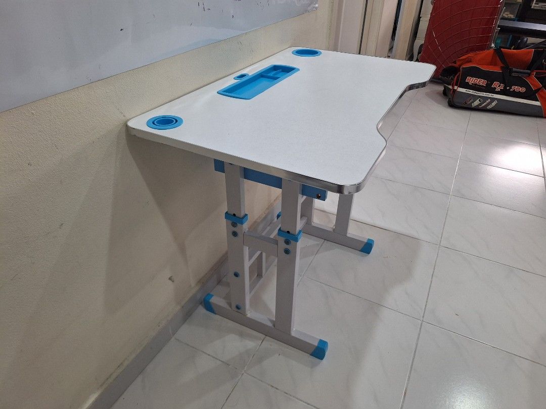 Table (Category: Tables & Sets) located in Singapore. Submitted by hibiscusmy (Listing ID 1442739610, Image 3). Description: Table , adjustable height, strong and sturdy, not loose. Length 79 cm. width 48 cm. height 66 cm..