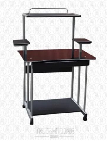 TCOM-024 | Computer Table with Glass Tabletop (Category: Tables & Sets) located in Caloocan City. Submitted by jimtapitan_trishtinecorp. (Listing ID 1442758379, Image 1). Description: - Compact computer desk ideal for small workspaces. - Features a main desk surface, top shelf, and lower shelf for storage. - Includes additional side shelves for extra organization. - Sturdy silver-toned metal frame. - Dark brown/black finished surfaces. - Equipped