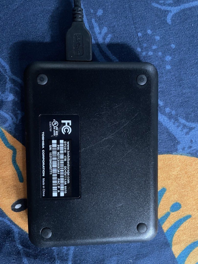 Toshiba External Hard Drive USB 3.0 (Category: Hard Disks & Thumbdrives) located in Manila. Submitted by jhayliink (Listing ID 1442811544, Image 2). Description: - Toshiba External Hard Drive - USB 3.0 Connectivity - Sleek Black Glossy Finish - Ideal for Expanding Storage Space - Fully Functional and Tested - Includes USB Cable - Ready for Immediate Use.