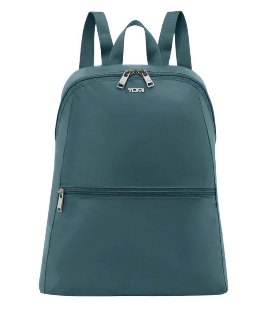 TUMI "Just In Case" Packable Backpack (Category: Backpacks) located in Las Pinas. Submitted by elenakrizzia (Listing ID 1442915833, Image 3). Description: TUMI 'Just In Case' Packable Backpack Color: Lagoon with Silver hardware Brandnew, Never been used. Gift. Bought in LA. Reason for selling: Not my color. PH Price 11k+.