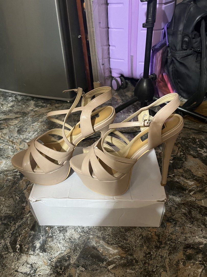Venus Pageant Nude Platform Strappy Heels (Category: Heels) located in Panabo. Submitted by dollieafits (Listing ID 1442829038, Image 2). Description: - Beige/nude platform heels - Strappy design - Ankle strap with buckle closure - Adds substantial height with platform - Ideal for parties and events.