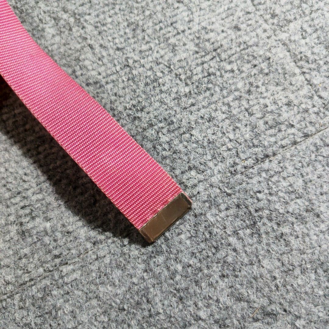 Vintage Adidas Buckle Belt (Category: Belts) located in Antipolo. Submitted by soon2byours_ (Listing ID 1442874946, Image 3). Description: - Pink Adidas belt - Features a metal buckle with the iconic Adidas logo - Durable webbing strap, perfect for everyday use - Adjustable length for a comfortable fit - Ideal for casual outfits - Shows some signs of wear on the buckle.