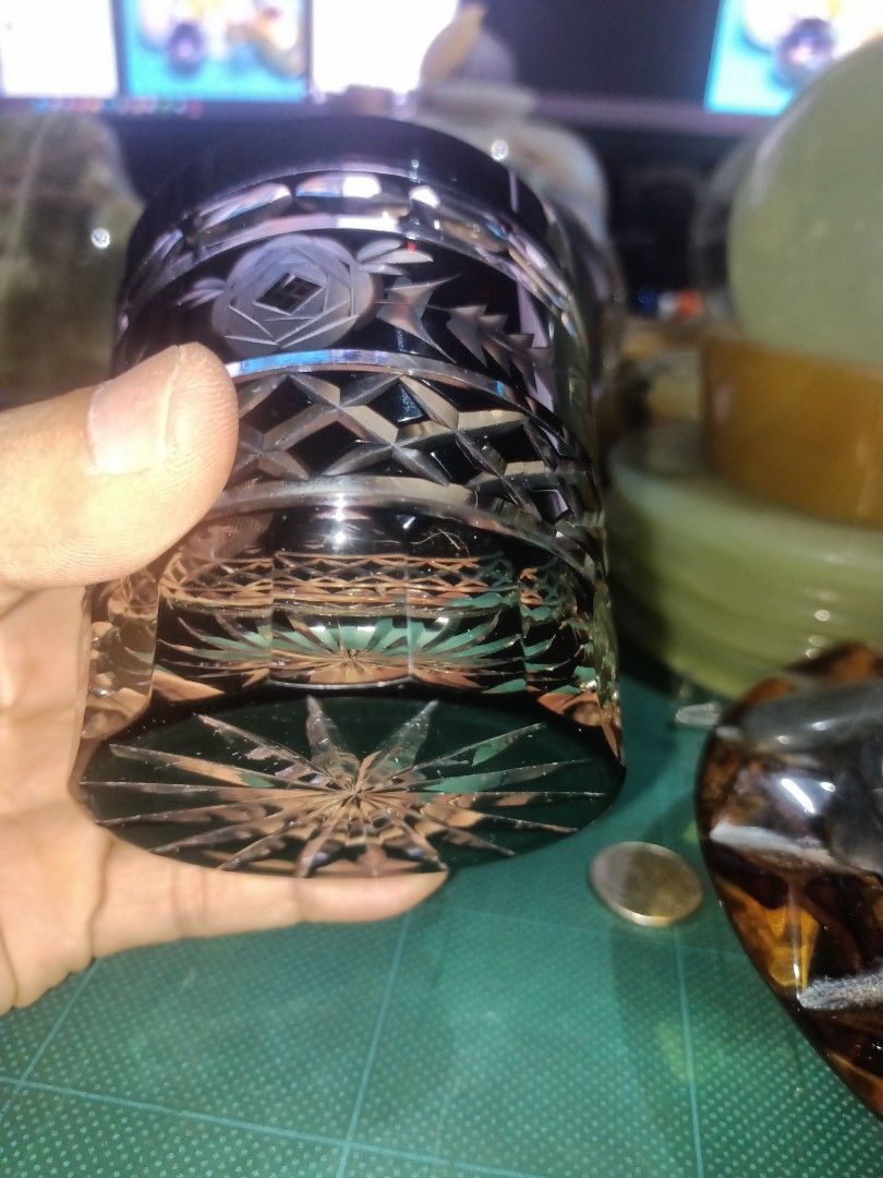 Vintage Edo Kiriko Whiskey Glass (Category: Water Bottles & Tumblers) located in Munoz. Submitted by larryc1212 (Listing ID 1442742254, Image 2). Description: - Beautiful dark amber cut glass tumbler. - Features intricate geometric and floral etched patterns. - Starburst design on the base. - Ideal for whiskey or any beverage. - Adds sophistication to your barware. - Approximately 4 inches tall. .