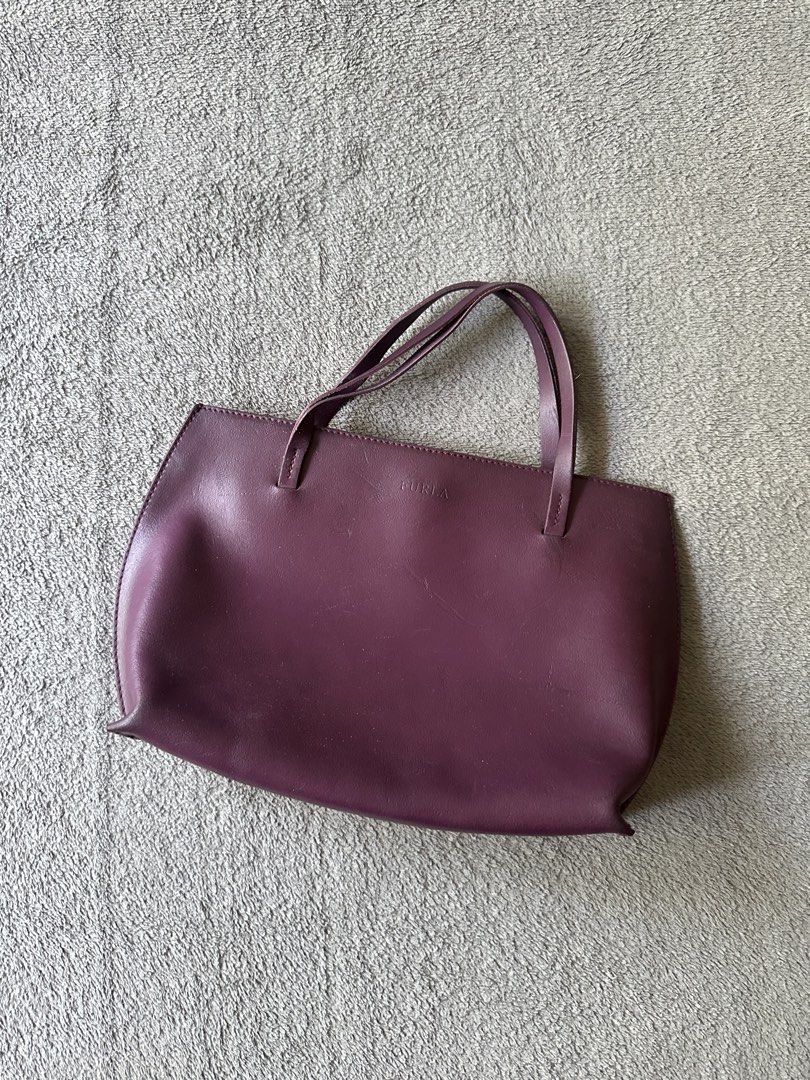 Vintage Furla Mini Tote Bag (Category: Purses & Pouches) located in Lipa City. Submitted by bagabonds (Listing ID 1442925943, Image 1). Description: - Has marks on the leather - the handle seperated but doesn't affect the totality of the bag - Clean edges - 11.5" Width, 7.5" Height Can send more photos :).