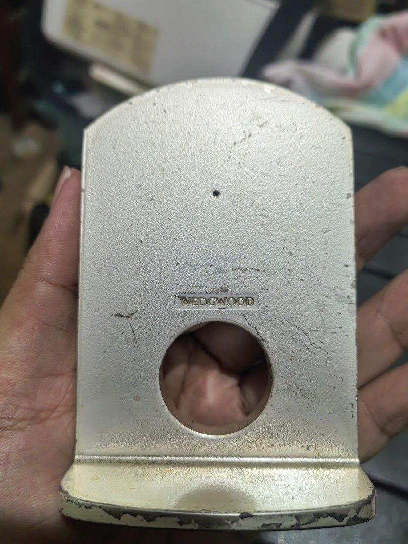Wedgewood Mini Mantel Clock (Category: Clocks) located in Cebu City. Submitted by dudes_villanueva (Listing ID 1442734473, Image 3). Description: Wedgewood Mini Mantel Clock Metal Body Clock Mechanism: Seiko Made in Taiwan. 📌 Body has visible scuffs and scratches. 📌 Clock in excellent working condition. No scratches or tarnish on metal rim. 📌 Has missing lower part. Sold as is. 📌 New battery installed Height: 4 inch.