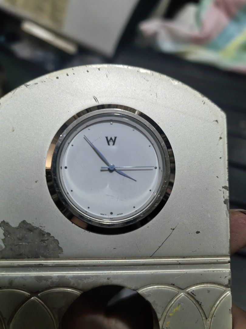 Wedgewood Mini Mantel Clock (Category: Clocks) located in Cebu City. Submitted by dudes_villanueva (Listing ID 1442734473, Image 2). Description: Wedgewood Mini Mantel Clock Metal Body Clock Mechanism: Seiko Made in Taiwan. 📌 Body has visible scuffs and scratches. 📌 Clock in excellent working condition. No scratches or tarnish on metal rim. 📌 Has missing lower part. Sold as is. 📌 New battery installed Height: 4 inch.