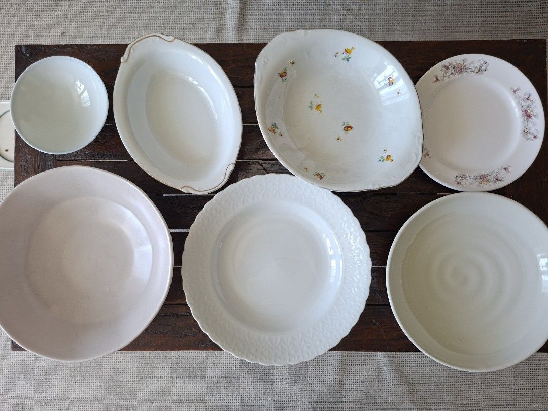White Ceramic Plates and Bowls Set 7pcs. (Category: Dinnerware & Cutlery) located in Taguig. Submitted by kitssale (Listing ID 1442752088, Image 1). Description: - Set of white ceramic plates and bowls - Various sizes included for different uses - Some pieces feature subtle decorative patterns - Ideal for everyday meals and special occasions - Clean and ready for a new home.