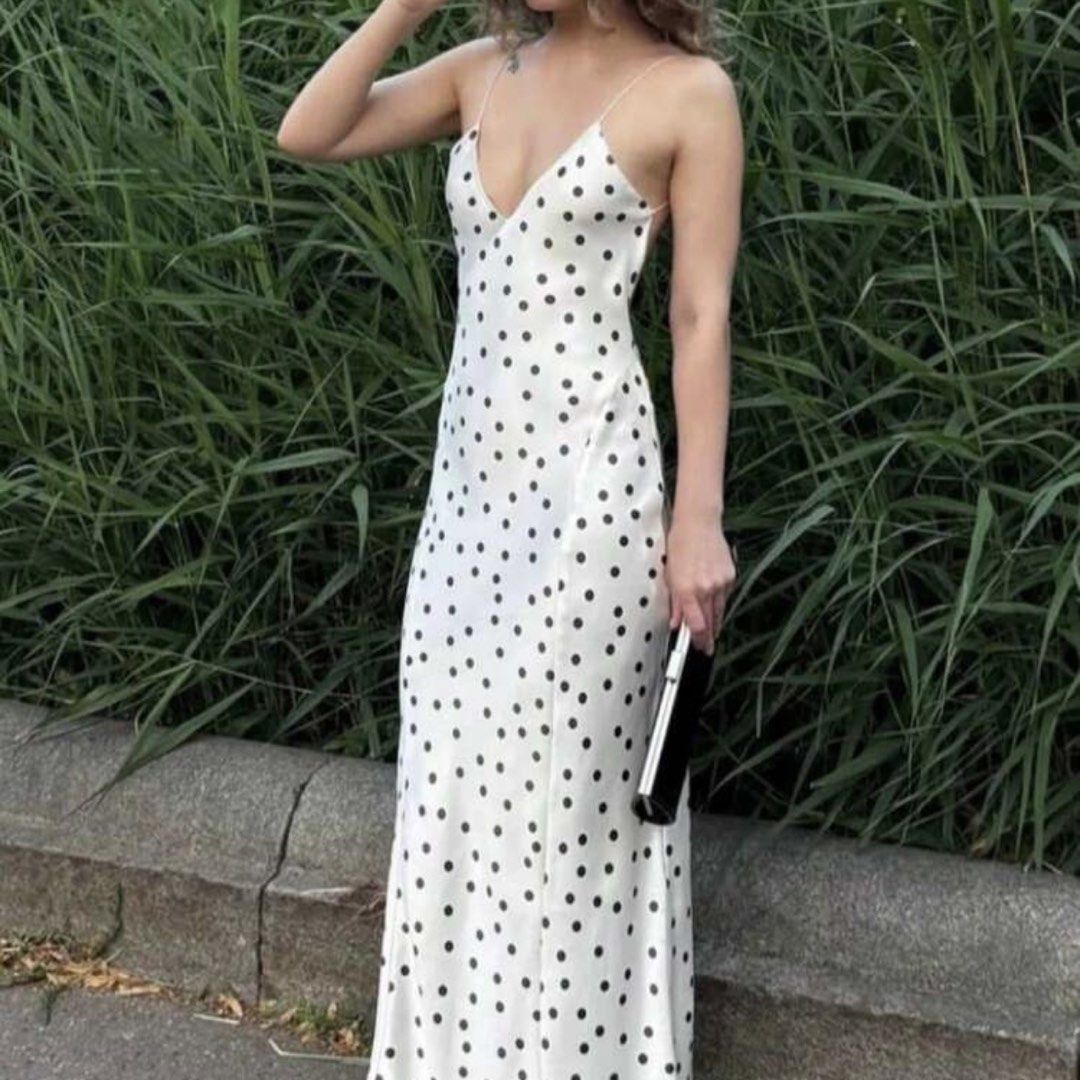 White Satin Polka Dots Backless Maxi Dress (Category: Evening dresses & gowns) located in Quezon City. Submitted by danalou (Listing ID 1442863839, Image 1). Description: - size small-semi medium - can be worn as a criss cross/halter dress - never used but washed once - perfect for dinner dates.