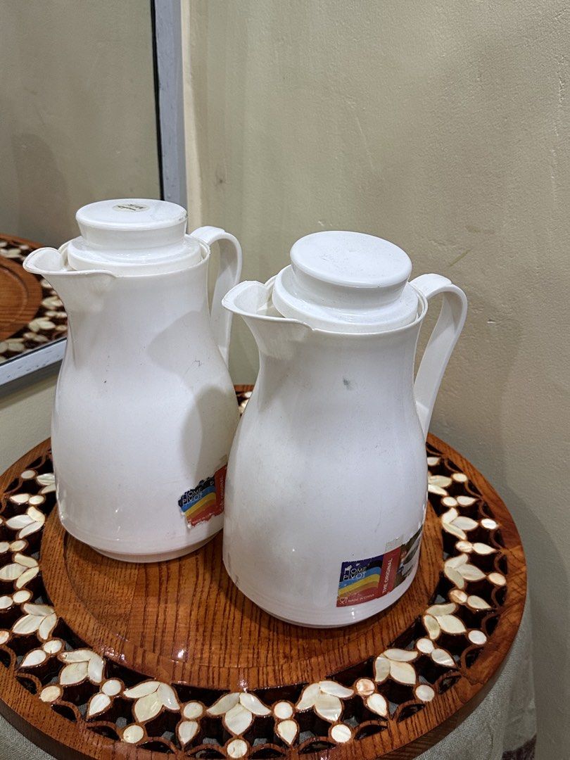 White Thermos Flasks (Set of 2) (Category: Water Bottles & Tumblers) located in Manila. Submitted by tenshiii185 (Listing ID 1442890735, Image 1). Description: (BUY 1 GET 1) - Set of 2 white thermos flasks - Keeps drinks hot or cold - Features sturdy handles - Lids provide a good seal - Ideal for picnics, travel, or daily use .