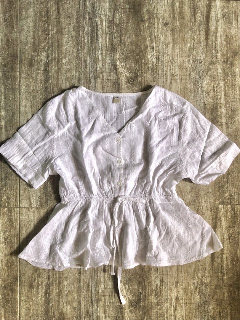 White women peplum top (Category: Others Tops) located in Urdaneta. Submitted by byells (Listing ID 1442750970, Image 2). Description: Medium on tag will fit Small to medium Like new Garter on waist.