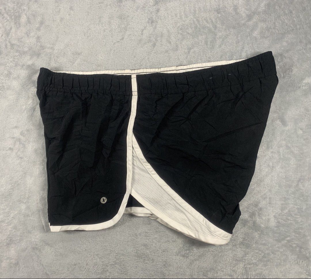 Xersion Black Running Shorts with White Trim Size S (Category: Activewear) located in Manila. Submitted by marksaban81396 (Listing ID 1442746314, Image 3). Description: Waistline 29-33 Lenght 11 Color rate 10/10 No issue Excellent condition - Brand: Xersion - Color: Black - Style: Running Shorts - Features: White trim, mesh side panel, elastic waistband with drawstring - Size: S - Ideal for: Workouts, casual wear - Origin: Made in Vietnam.